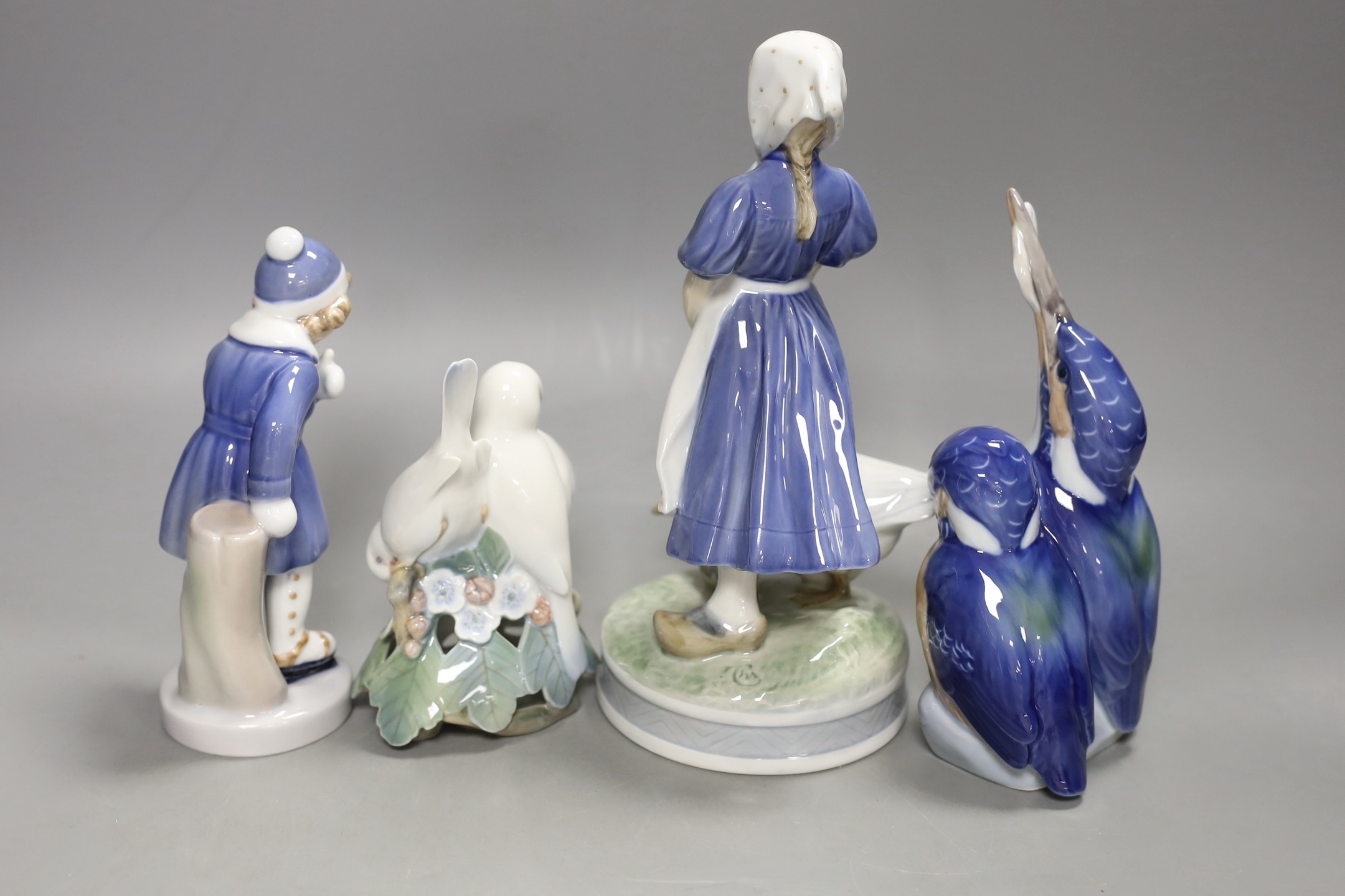 Two Royal Copenhagen figurines and two bird groups- tallest girl with duck 23 cms high.